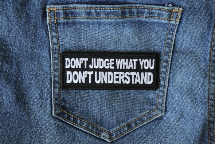 Don't Judge What You Don't Understand Patch shown on jeans