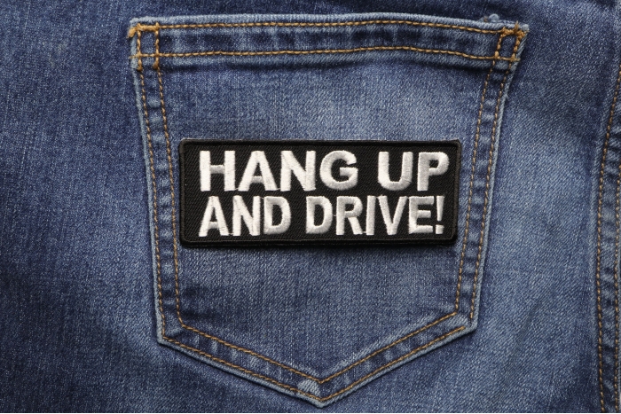 Hang Up and Drive Patch shown on jeans