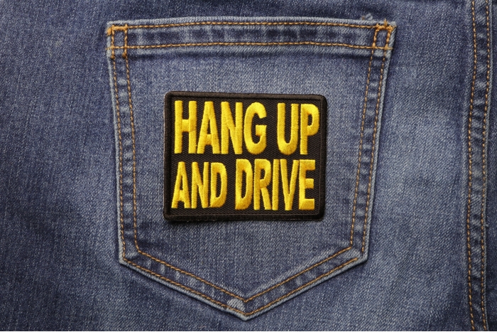 Hang Up and Drive Patch shown on jeans