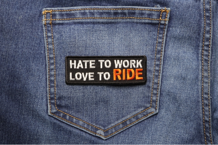 Hate To Work Love To Ride Patch shown on jeans