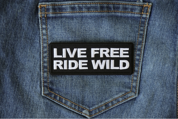 Live Free Ride Wild Patch shown on jeans