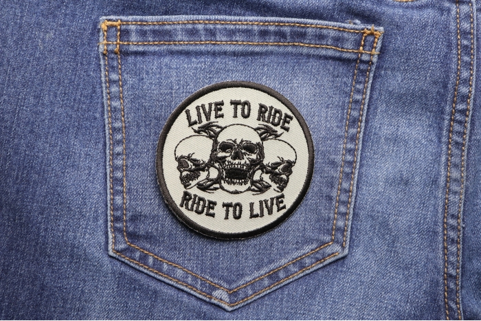 Live To Ride Ride To Live Three Skulls Patch shown on jeans