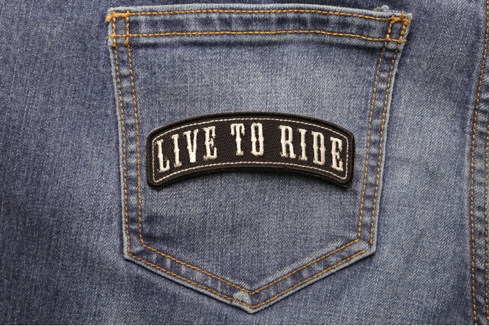 Live To Ride Patch shown on jeans