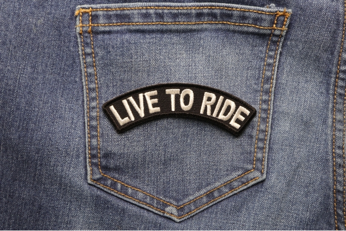 Live To Ride Patch shown on jeans
