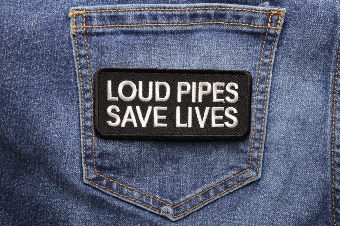 Loud Pipes Save Lives Patch shown on jeans