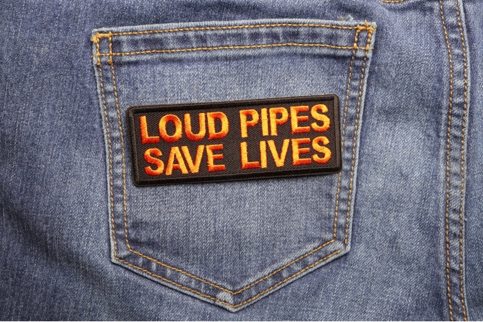Loud Pipes Save Lives Patch shown on jeans