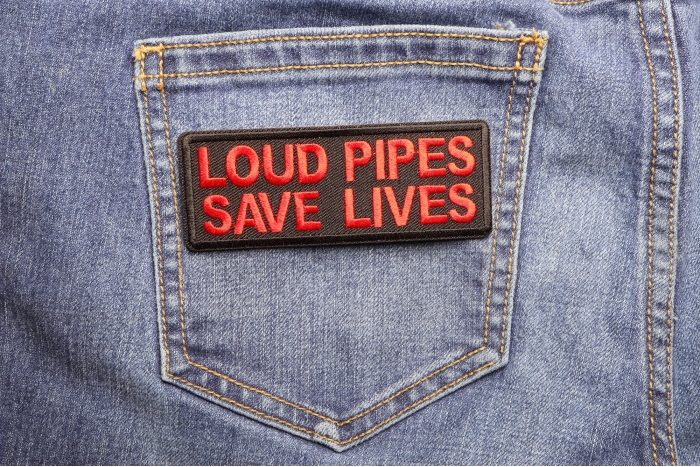 Loud Pipes Save Lives Patch shown on jeans