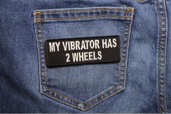 My Vibrator Has 2 Wheels Patch shown on jeans