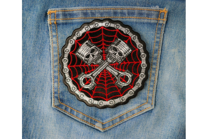 Spider Web Piston Skull Patch shown on jeans
