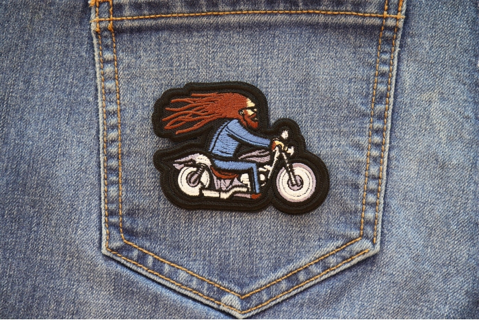 Hair in the Wind Biker on Motorcycle Patch shown on jeans