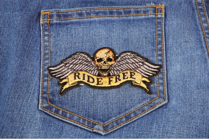 Ride Free Skull and Wings Patch shown on jeans