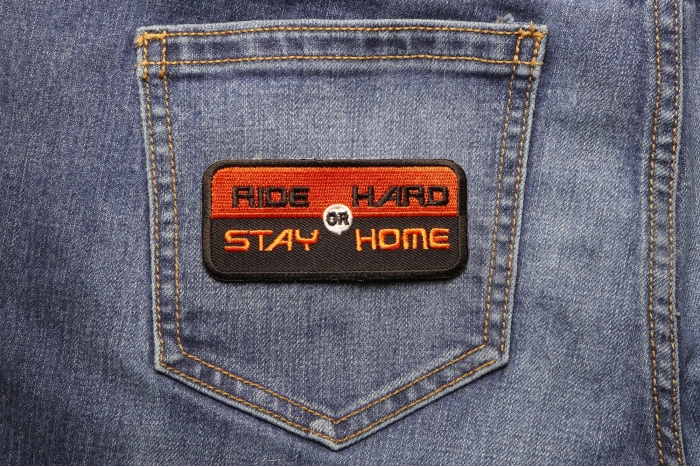 Ride Hard or Stay Home Patch shown on jeans