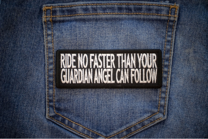 Ride No Faster Than Your Guardian Angel Can Follow Patch shown on jeans