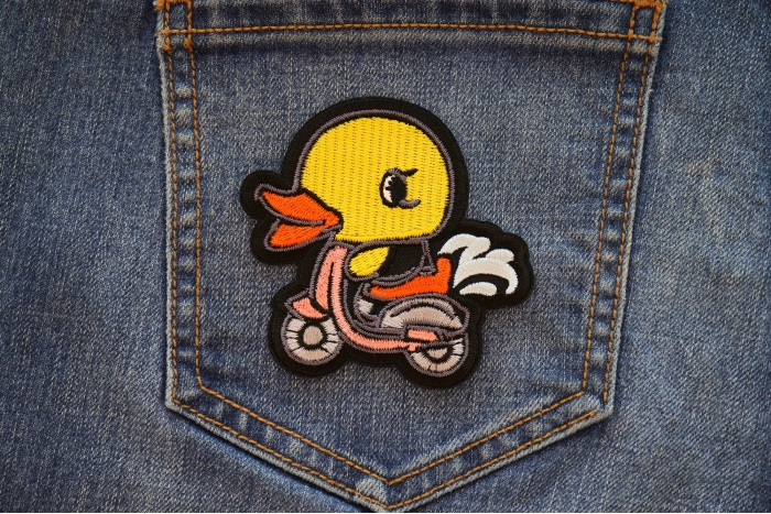 Scooter Duck Patch shown on jeans