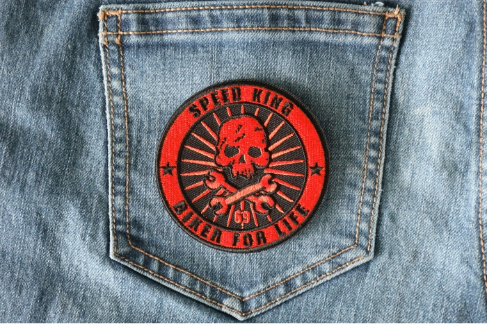 Speed King Biker For Life Crossed Wrenches and Skull Patch shown on jeans