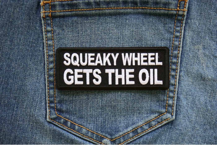 Squeaky Wheel Gets the Oil Patch shown on jeans