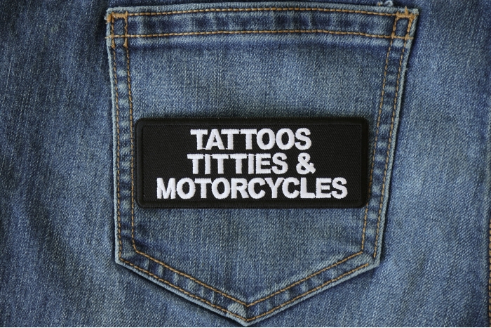 Tattoos Titties and Motorcycles Patch shown on jeans