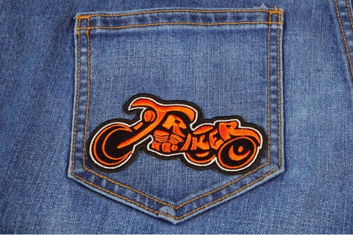 Triker Iron on Biker Patch In Orange and Black shown on jeans