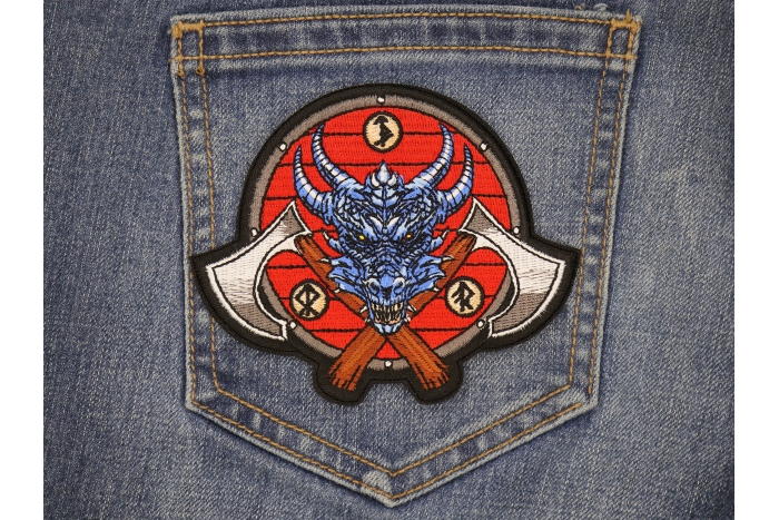 Viking Dragon and Axes Patch shown on jeans