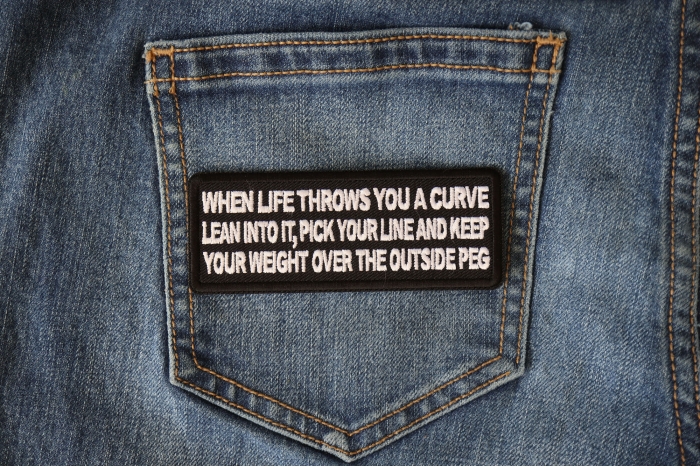 When Life throws you a curve, Lean into it, Pick your line and keep your weight over the outside Peg Patch shown on jeans
