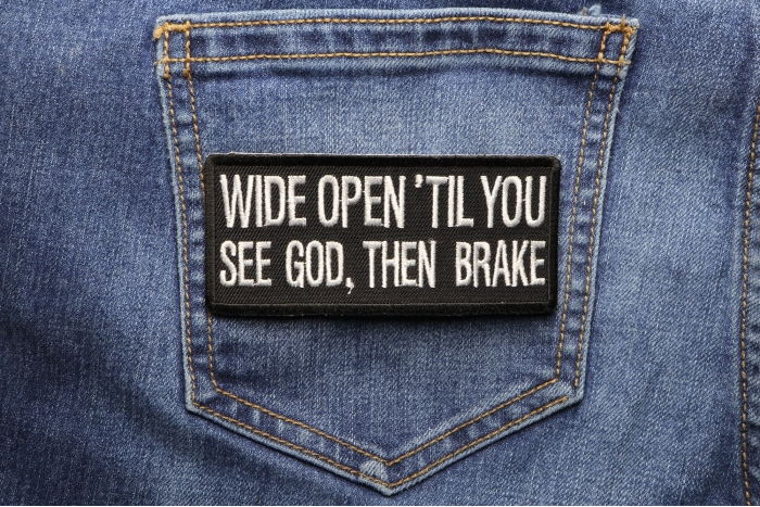 Wide Open Til You See God Then Brake Patch shown on jeans