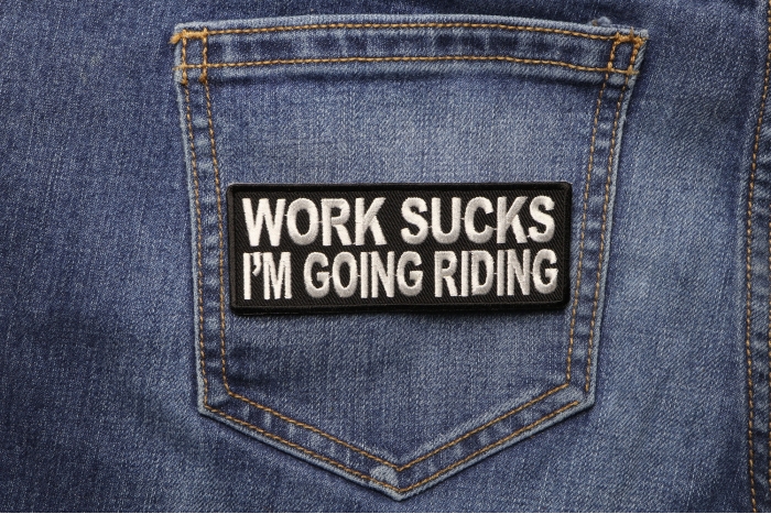 Work Sucks I'm Going Riding Patch shown on jeans