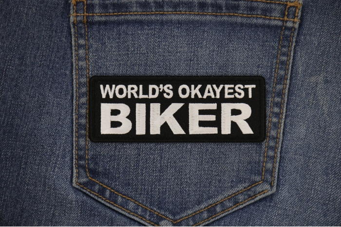 World's Okayest Biker Patch shown on jeans