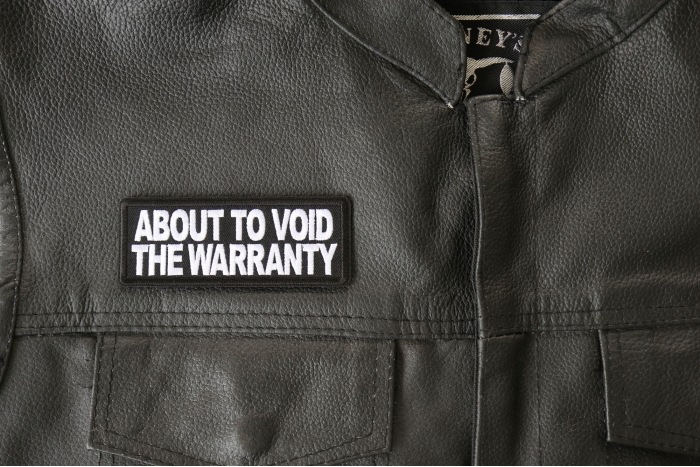 About to Void the Warranty Patch, Biker Saying Patches shown on leather vest