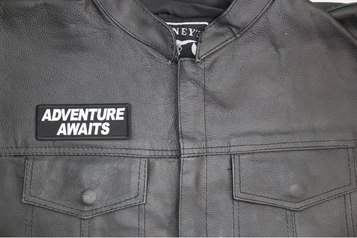 Adventure Awaits Patch, Biker Saying Patches shown on leather vest