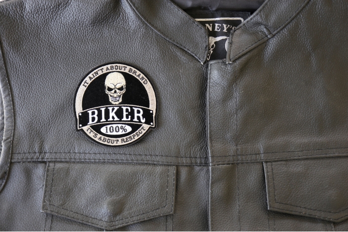 100 Percent Biker Skull, It Ain't About Brand It's About Respect Patch, Biker Skull Patches shown on leather vest
