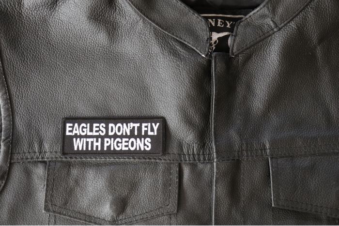 Eagles Don't Fly with Pigeons Patch, Biker Saying Patches shown on leather vest