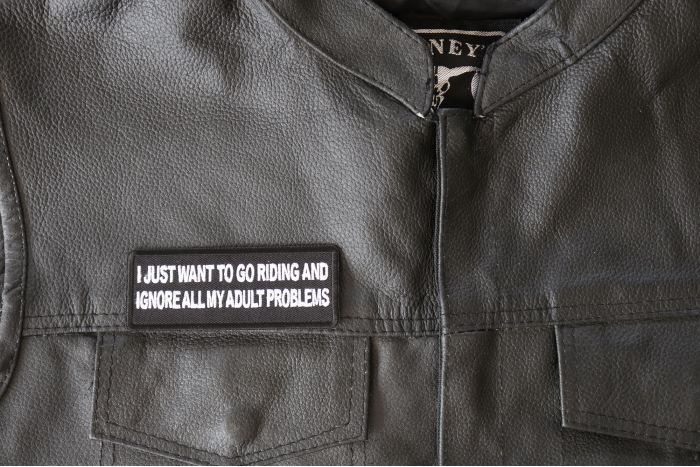 I Just Want to go Riding and Ignore all My Adult Problems Patch, Biker Saying Patches shown on leather vest