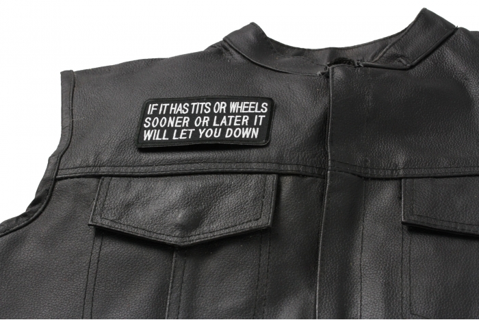 If It Has Tits or Wheels Sooner or Later It Will Let You Down Patch, Biker Saying Patches shown on leather vest