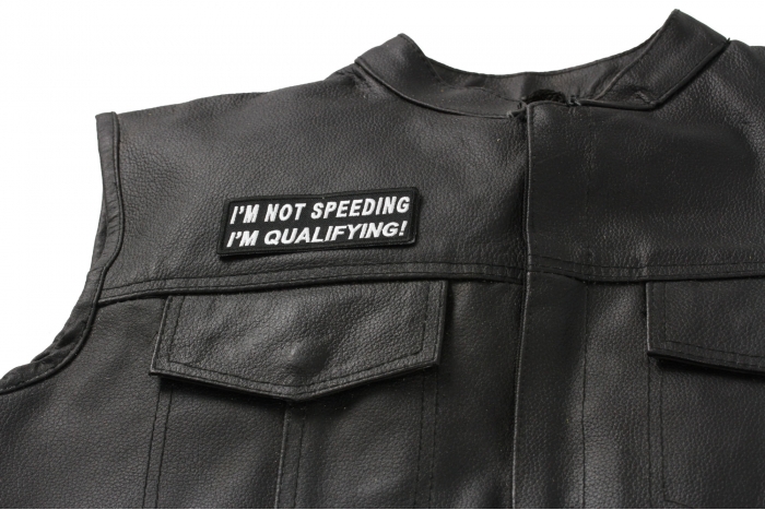 I'm Not Speeding I'm Qualifying Patch - Iron on Patch - 3.75x1.5 inch shown on leather vest
