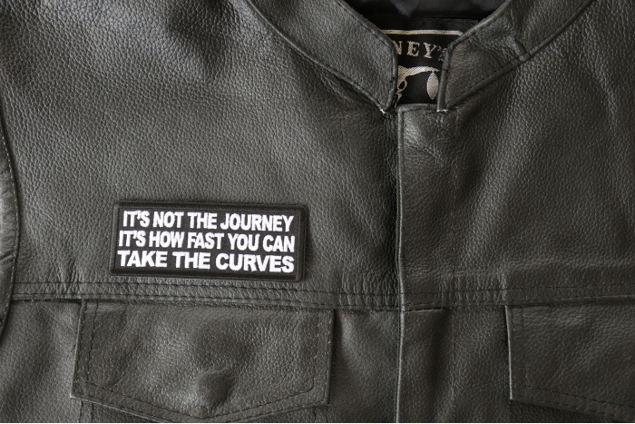 It's not the Journey It's How Fast you can take the Curves Patch, Biker Saying Patches shown on leather vest