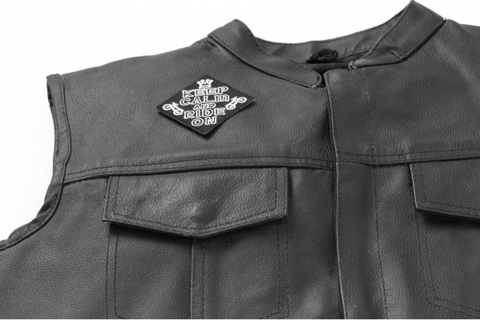 Keep Calm and Ride On Patch - 3x3 inch. Embroidered Iron on Patch shown on leather vest