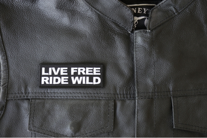 Live Free Ride Wild Patch, Biker Saying Patches shown on leather vest