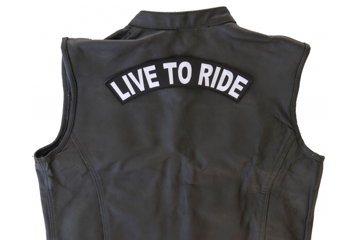 shown on leather vest