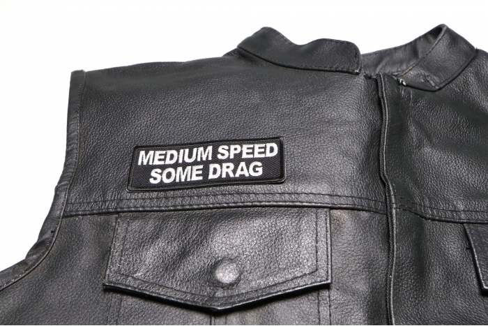 Medium Speed Some Drag Patch, Biker Saying Patches shown on leather vest