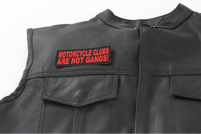 Motorcycle Clubs Are Not Gangs Patch, Biker Saying Patches shown on leather vest
