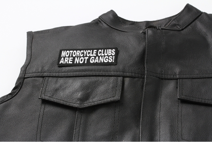 Motorcycle Clubs Are Not Gangs Patch, Biker Saying Patches shown on leather vest