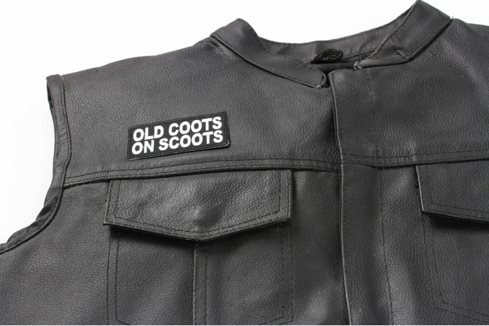 Old Coots On Scoots Patch - 3x2 inch. Embroidered Iron on Patch shown on leather vest