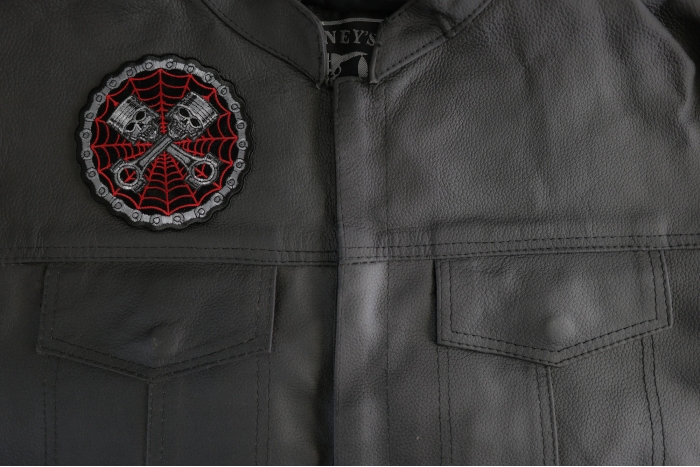 Piston Web Skulls Patch shown on leather vest