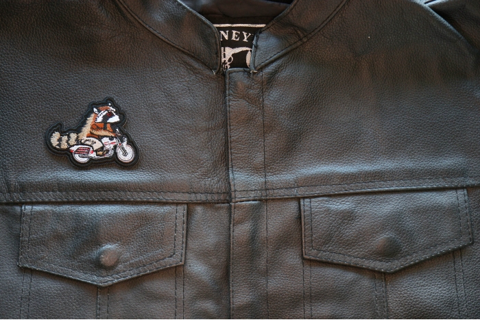 Motorcycle Jacket/Vest Embroidered Biker Patch - Raccoon on Motorcycle Patch shown on leather vest