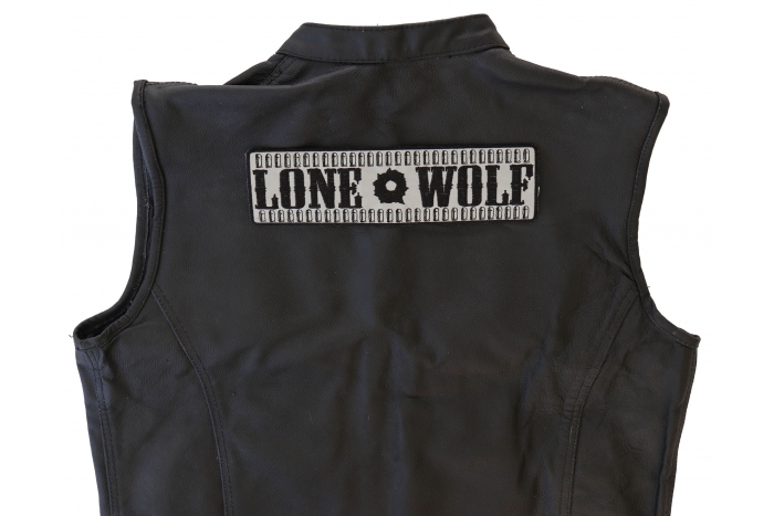 Reflective Lone Wolf Patch - Iron on Patch - 10x2.75 inch shown on leather vest