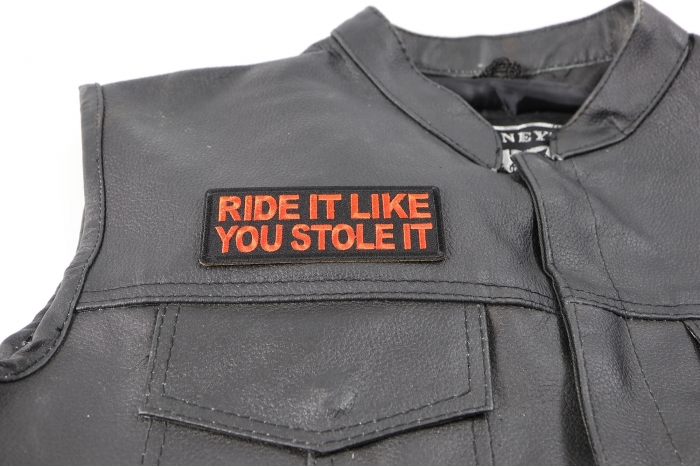 Ride It Like You Stole It Patch, Biker Saying Patches shown on leather vest