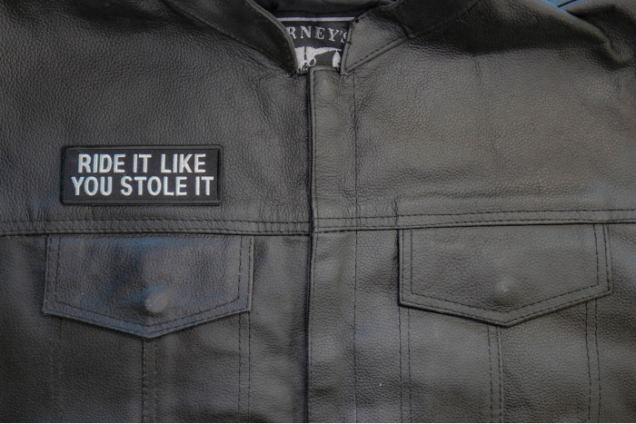 Ride It Like You Stole It Patch, Biker Saying Patches shown on leather vest