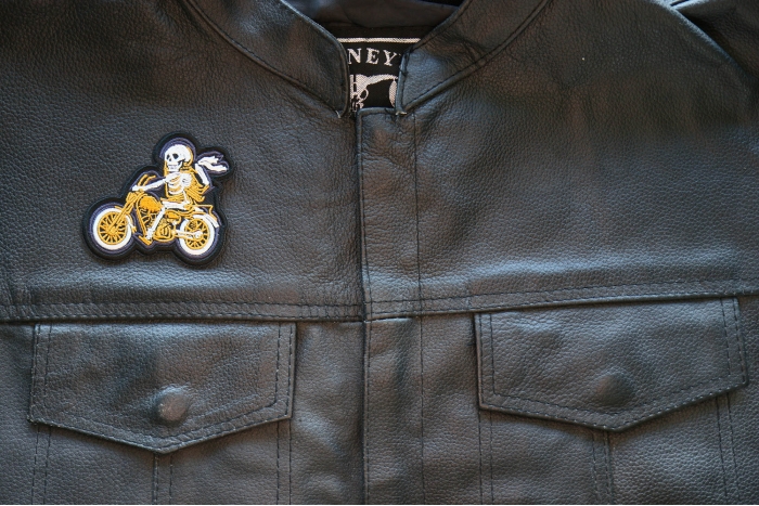 Motorcycle Jacket/Vest Embroidered Biker Patch - Skeleton Biker on Motorcycle Patch shown on leather vest