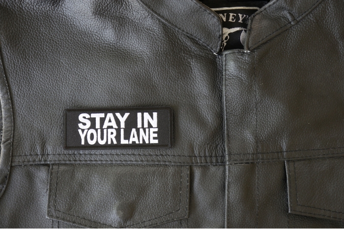 Stay in Your Lane Patch, Biker Saying Patches shown on leather vest