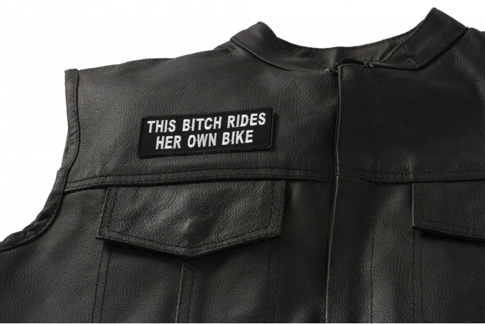 This Bitch Rides Her Own Bike Patch, Biker Saying Patches shown on leather vest